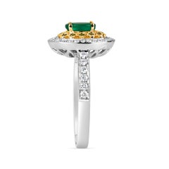0.86 Carat Emerald and Green and White Diamond White Gold Cluster Ring