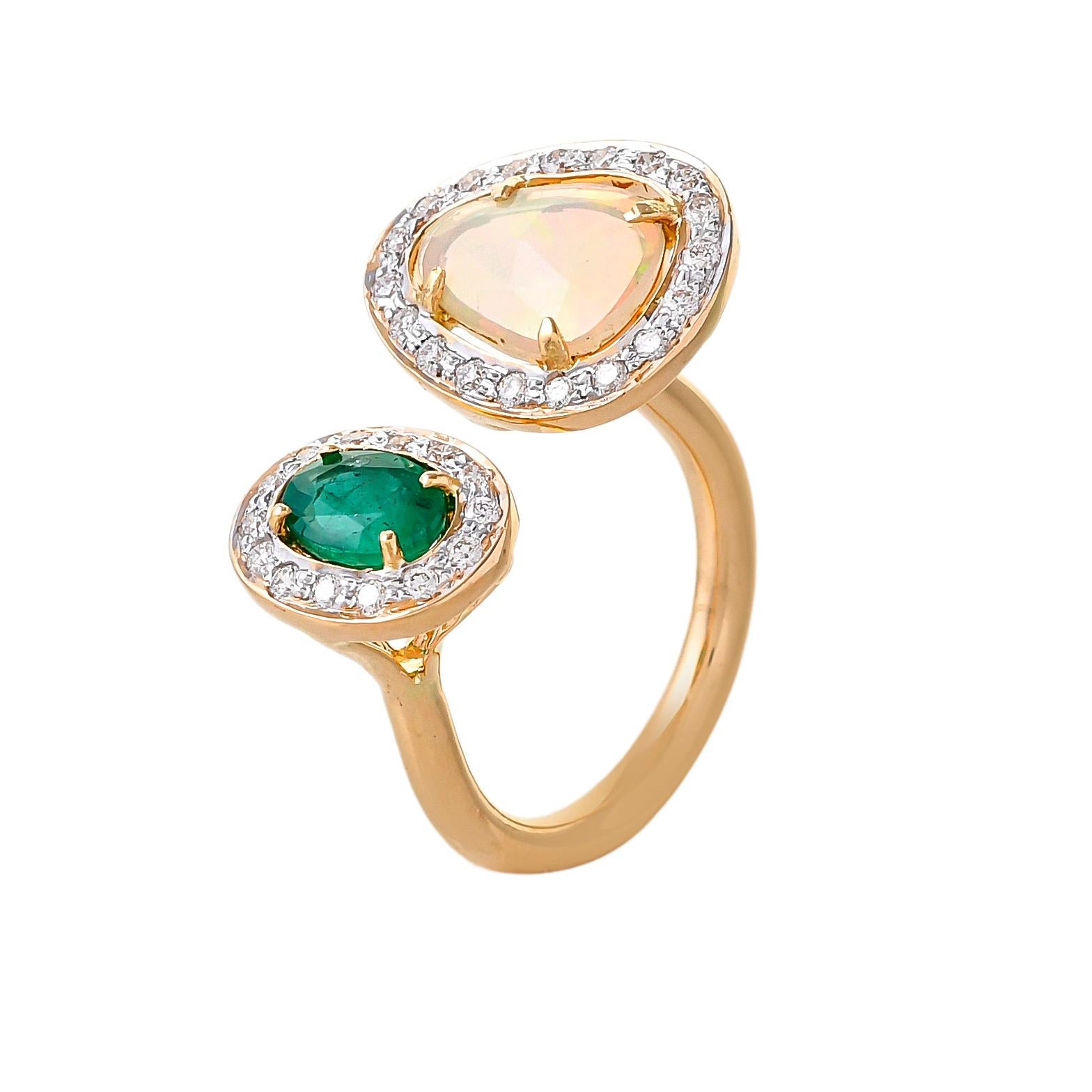 Let your hand do the talking by wearing this beautifully crafted ring featuring Ethiopian Opal Flat weighing approximately 0.86 carats accented by a fine color oval shaped emerald weighing approximately 0.92 carats surrounded with diamonds with a