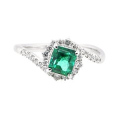 0.86 Carat, Natural, Colombian Emerald and Diamond Ring Set in Platinum