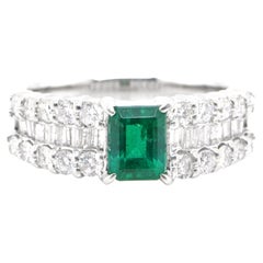 0.86 Carat Natural Emerald and Diamond Engagement Ring Set in Platinum