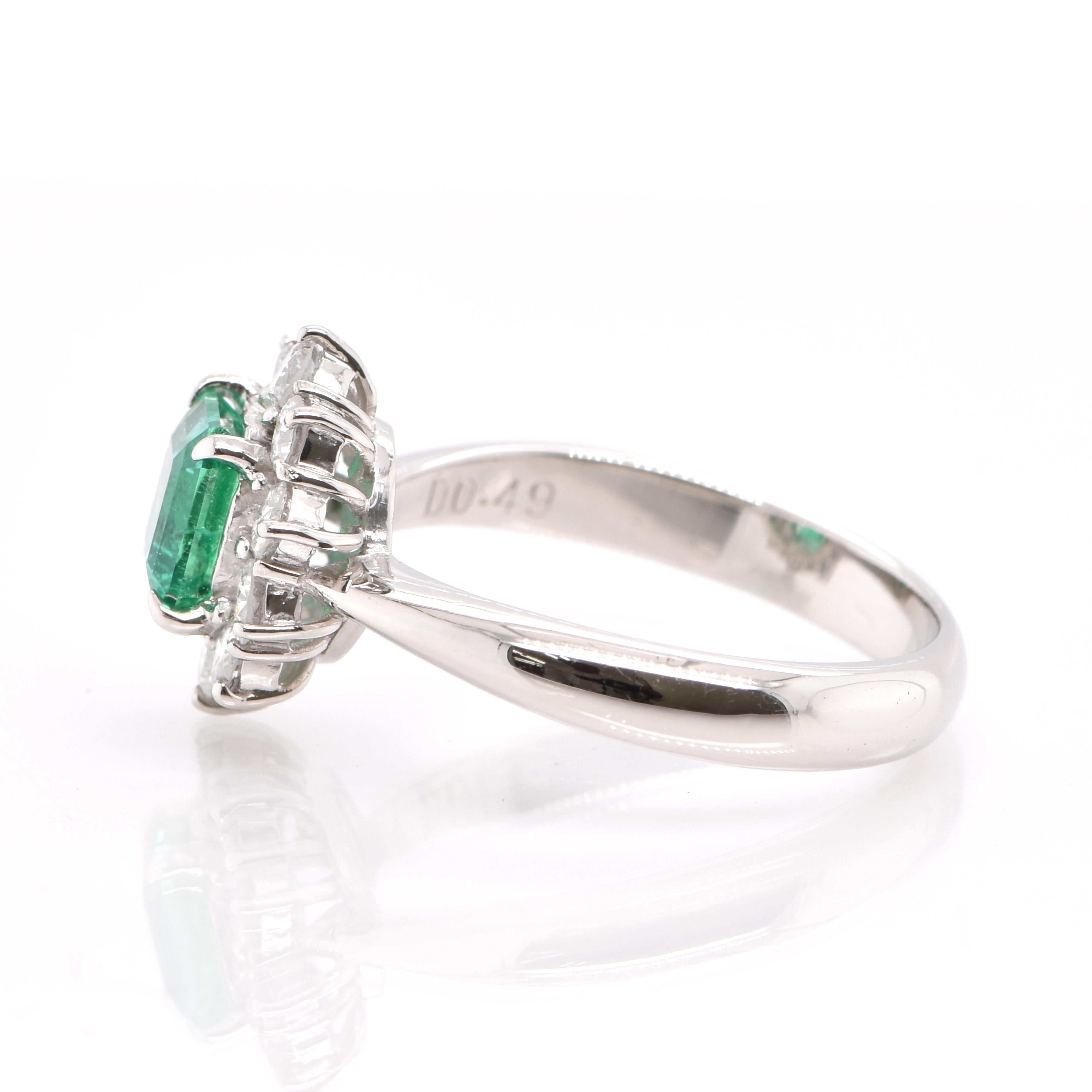 Emerald Cut 0.86 Carat Natural Emerald and Diamond Halo Ring Set in Platinum