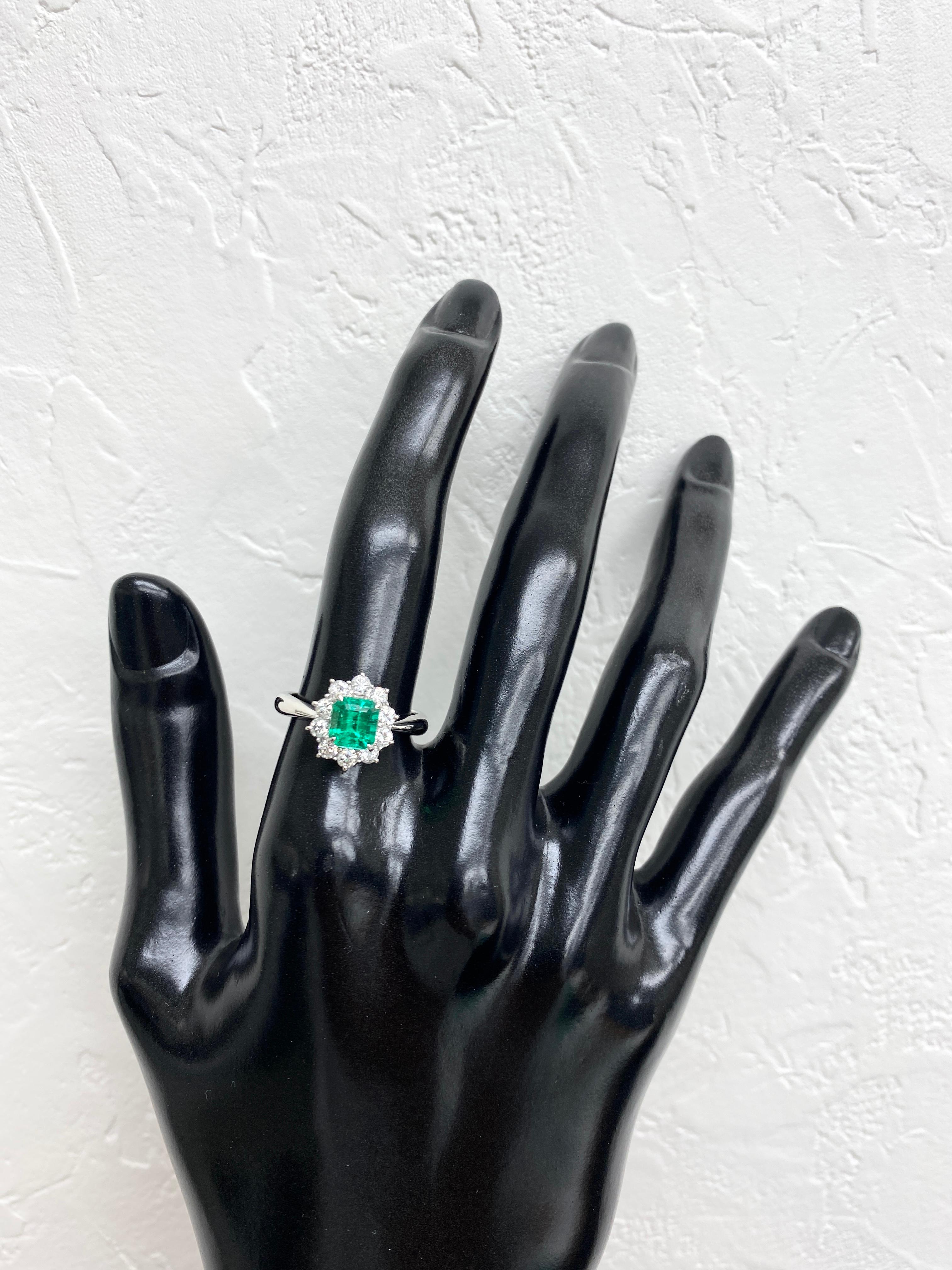 Women's 0.86 Carat Natural Emerald and Diamond Halo Ring Set in Platinum