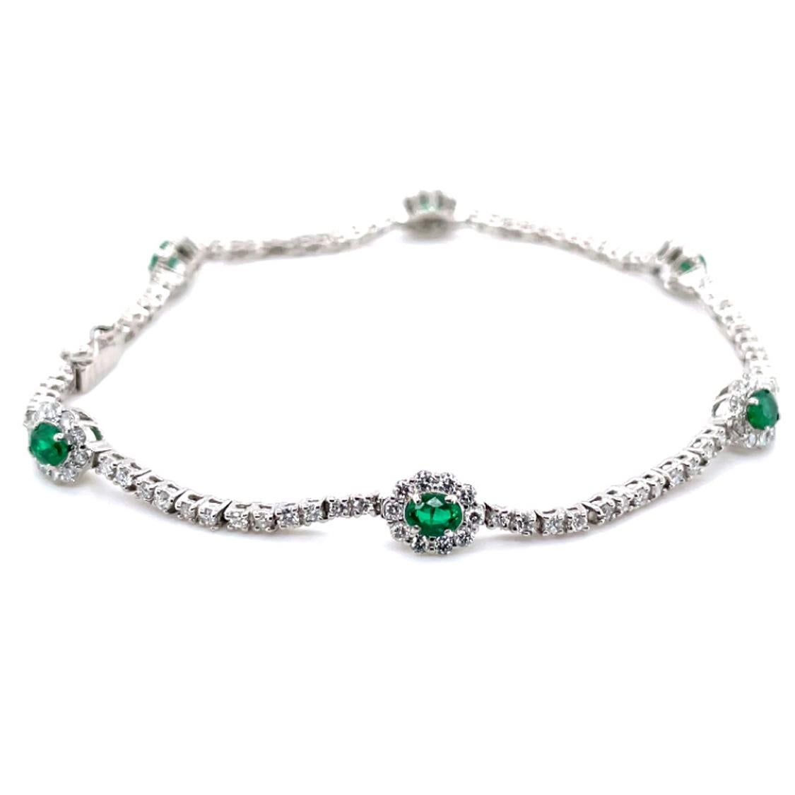 Oval Cut 0.86 Carat Natural Emeralds and Diamonds Tennis Bracelet Set in Platinum