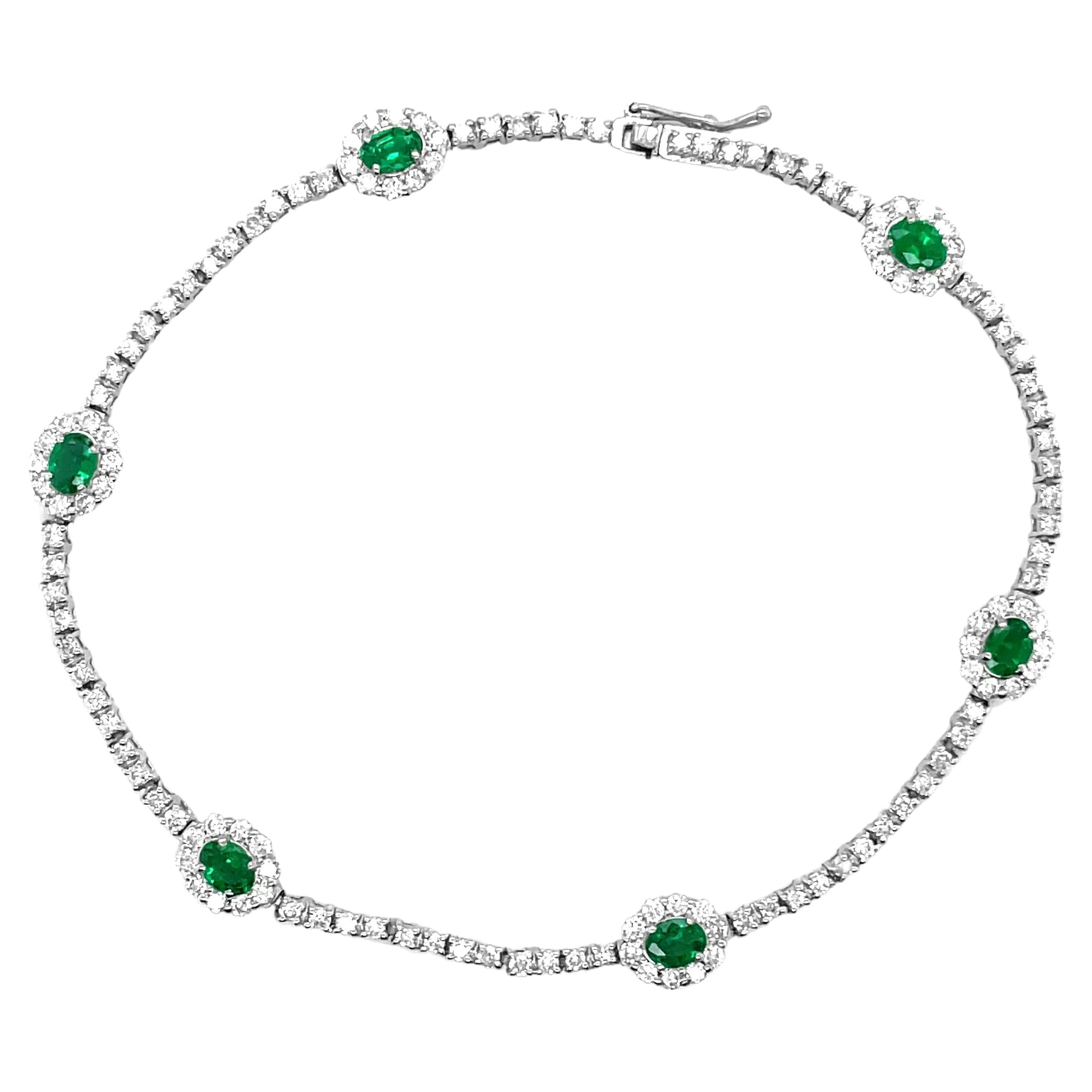 0.86 Carat Natural Emeralds and Diamonds Tennis Bracelet Set in Platinum