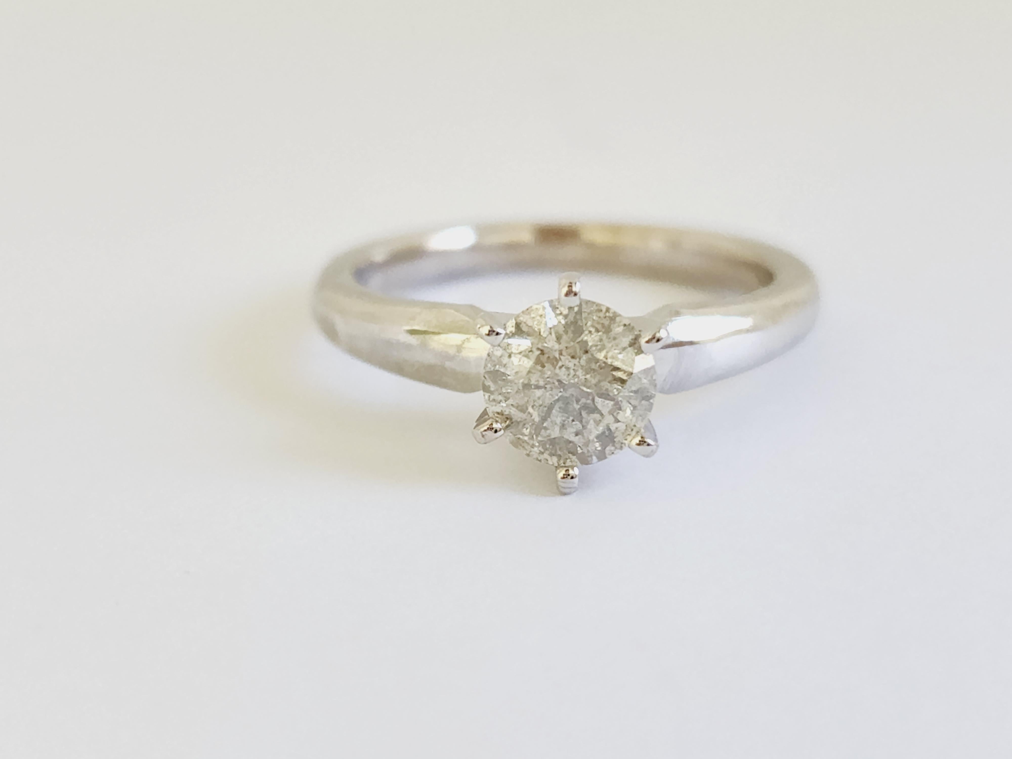 Natural 0.86 Carat Round Diamond Ring 14 Karat White Gold. Set on 6-prong Solitaire 14K white gold ring.
Ring size: 6.5