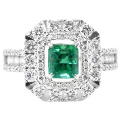 0.86 Carat Natural Vivid Green Emerald and Diamond Ring Set in Platinum