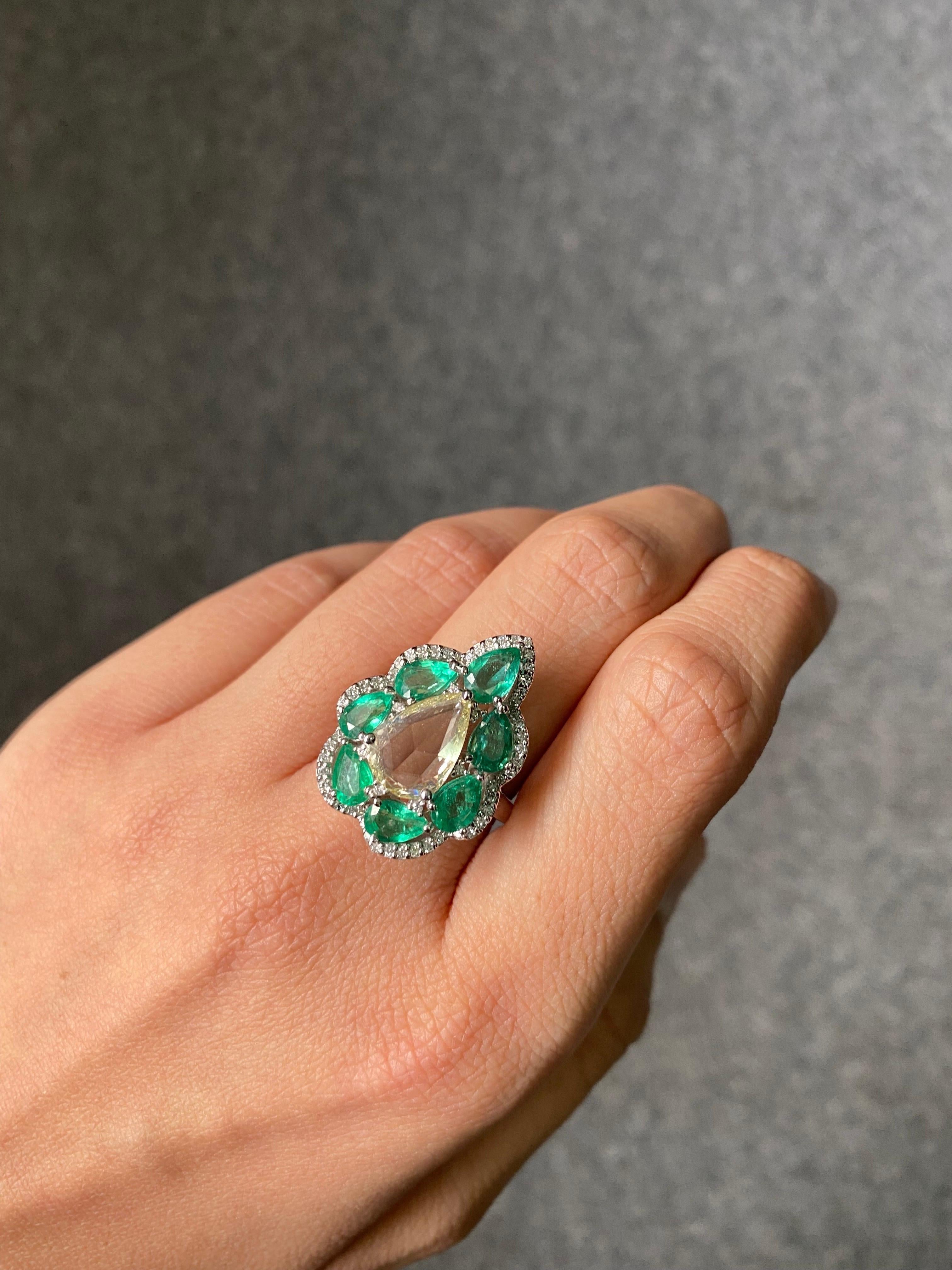 Art Deco 0.86 Carat Pear Shape Diamond and Emerald Engagement Ring For Sale