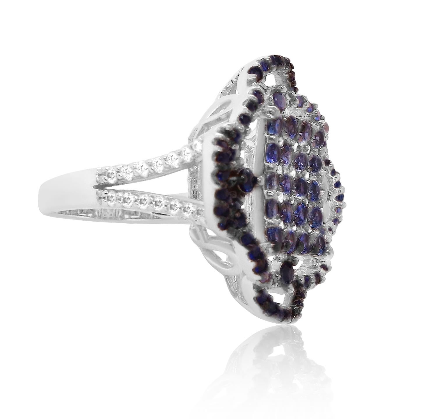 Material: 14k White Gold
Gemstones: 64 Round Blue Sapphires at 0.86 Carats
Stone Details: 9 Blue Sapphires at 1.21 Carats 
Diamond Details: 42 Brilliant Round White Diamonds at 0.35 Carats. SI Clarity / H-I Color. 

Fine one-of-a-kind craftsmanship