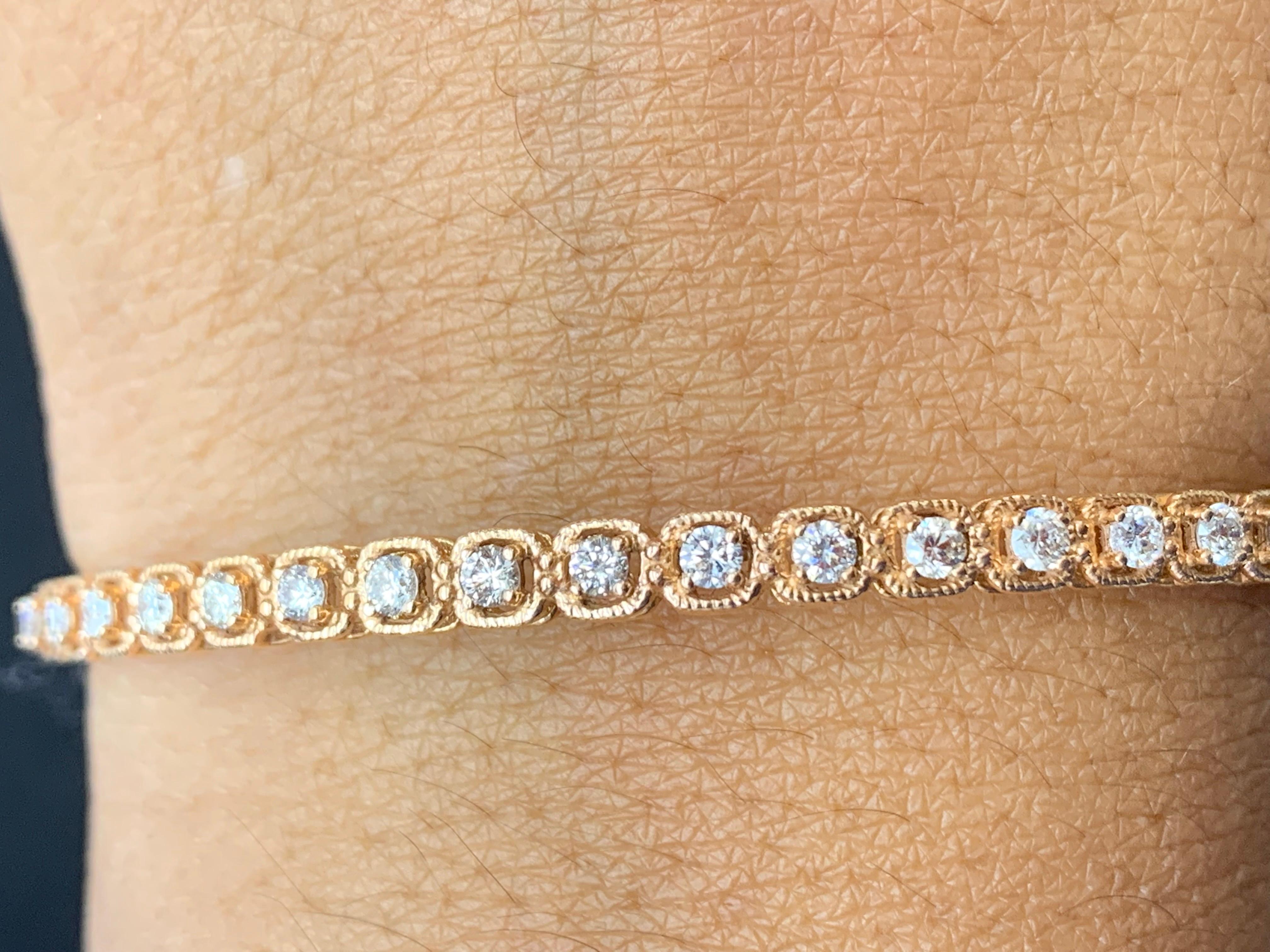 A stunning bangle bracelet set with 23 sparkling round diamonds weighing 0.86 carats total. Diamonds are set in rope design polished 14k rose gold. Double lock mechanism for maximum security. A simple yet dazzling piece.