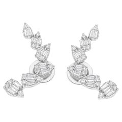 Pendientes de diseño curvo con diamantes baguette redondos SI/H de 0,86 quilates y oro blanco de 14 quilates