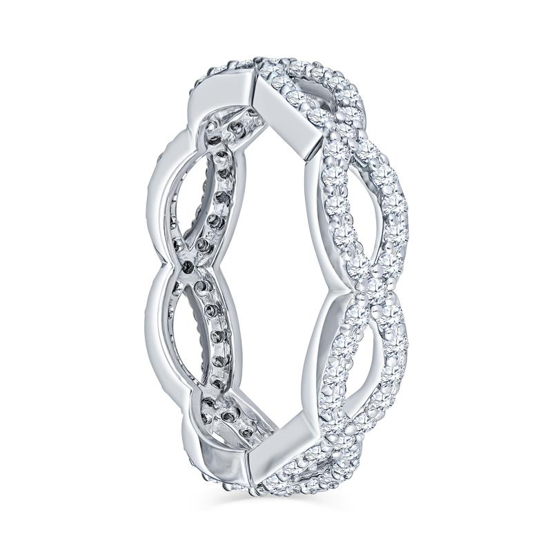 This infinity style eternity band features 0.86 carat total weight in shared prong-set round brilliant cut diamonds set in 14 karat white gold. It is a size 7.