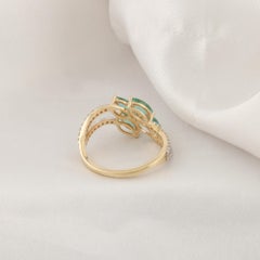 0.86 Carat Zambian Emerald 0.26 Carat SI/H Diamond Ring 14 Karat Yellow Gold