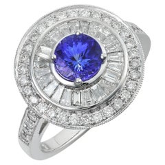 0.86 cts Natural Tanzanite 
0.93 cts Diamonds 18K White Gold Ring