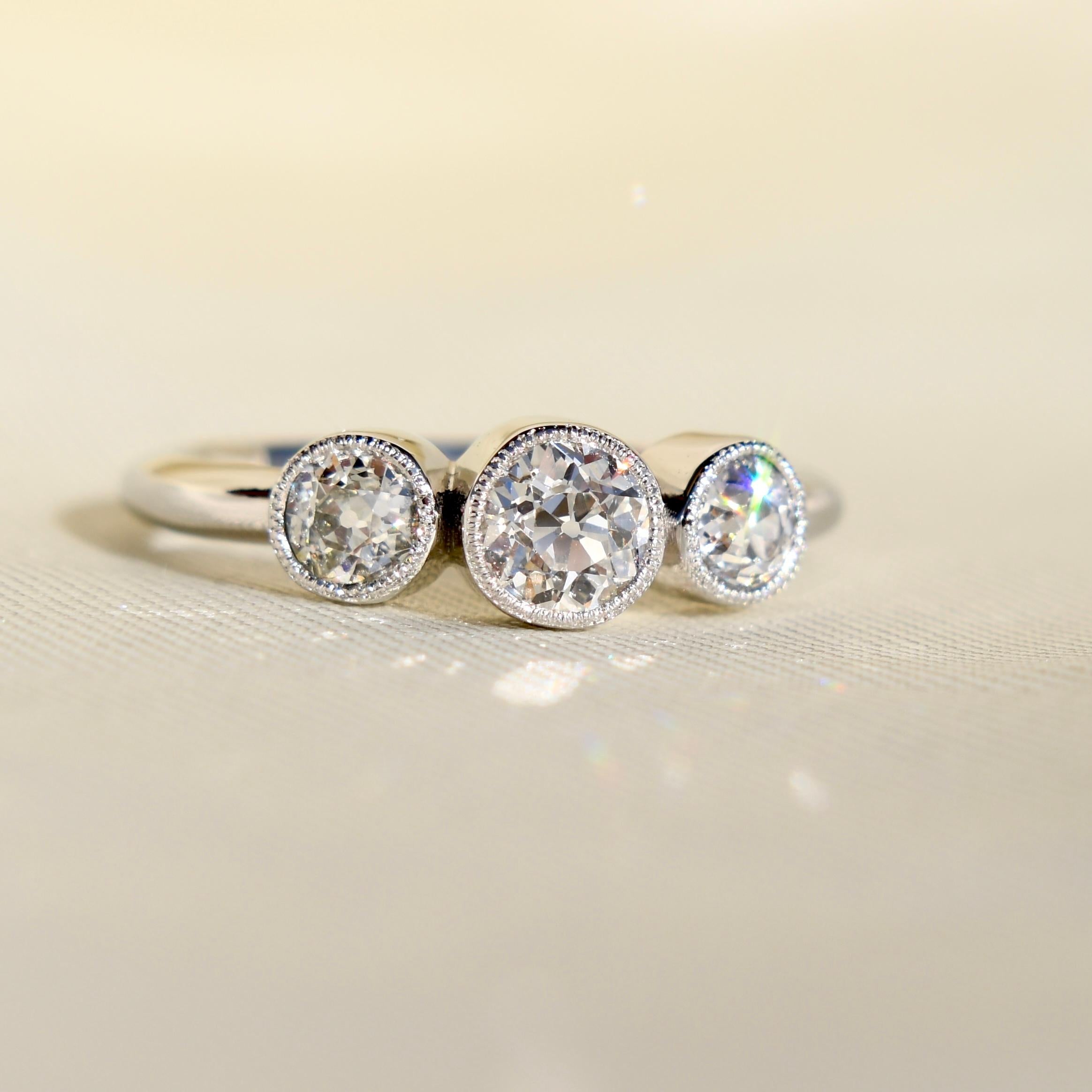 Art Deco 0.86ct old European cut diamond three stone ring with Millegrain, IGI certified For Sale