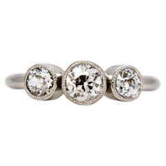 0.86ct old European cut diamond three stone ring with Millegrain, IGI certified 0.86ct old European cut diamond three stone ring with Millegrain, IGI certified
