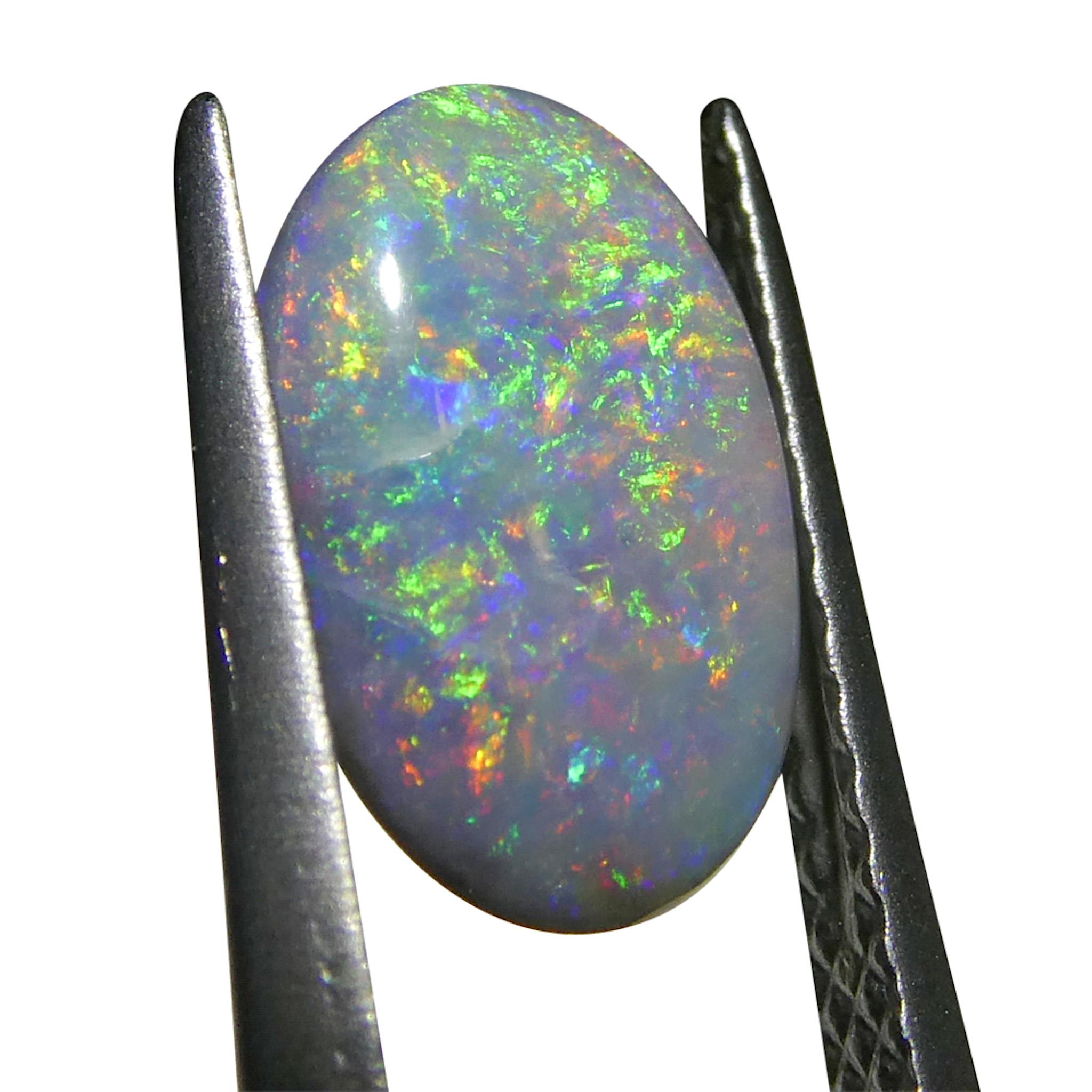 Taglio ovale 0.86ct Opale grigio ovale cabochon dall'Australia in vendita
