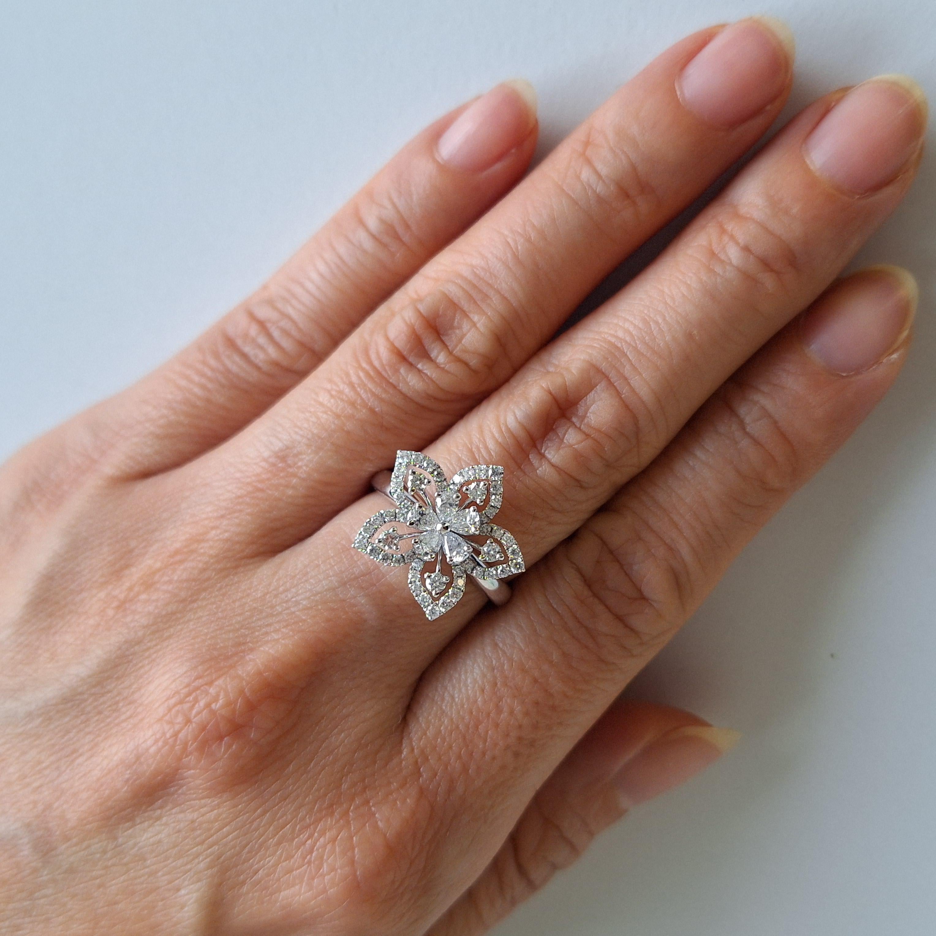 Pear Cut Pear shape and Round Brilliant cut White Diamond Platinum Cocktail Ring For Sale