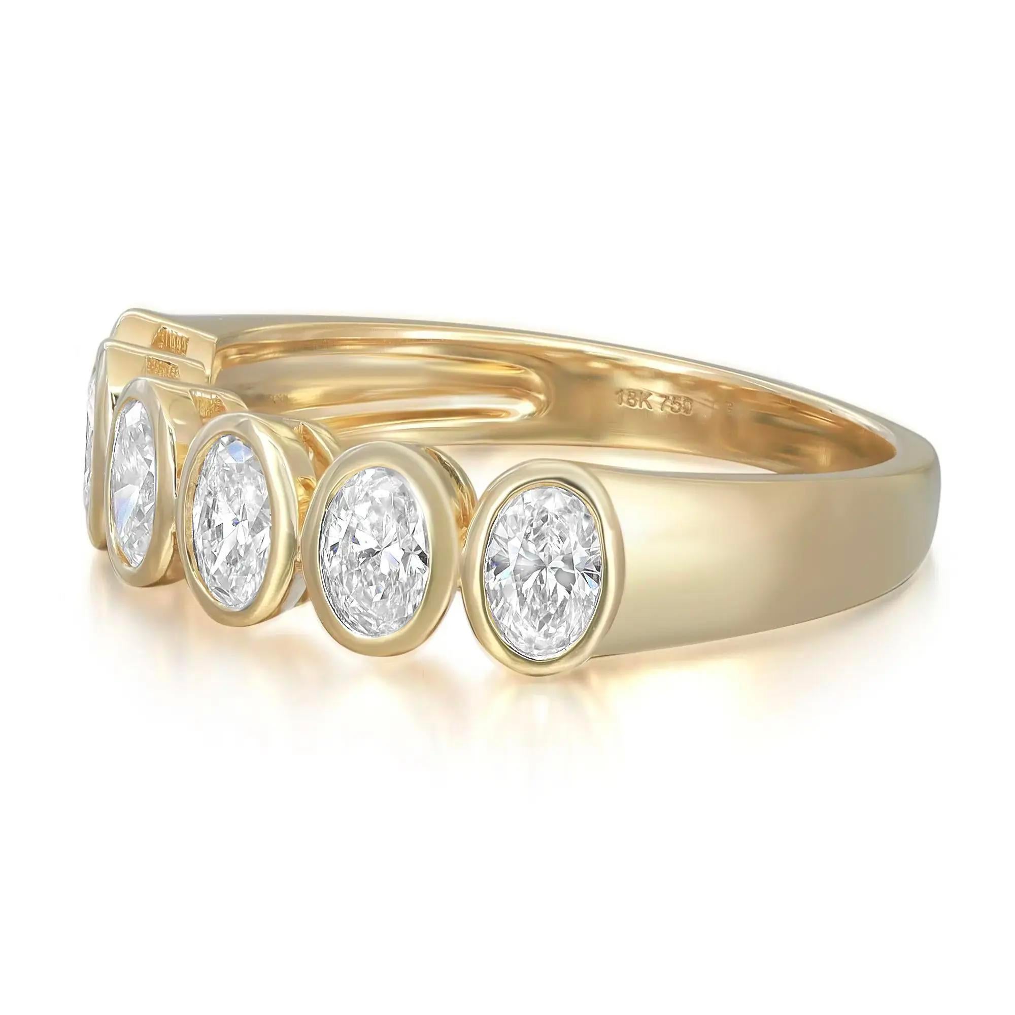 Celebrate everlasting love with this enchanting eternity band ring. Crafted in high polished 18K yellow gold. Showcasing 6 bezel set oval cut dazzling diamonds weighing 0.86 carat. Diamond quality: color G-H and clarity VS-SI. Ring size: 6.5. Width: