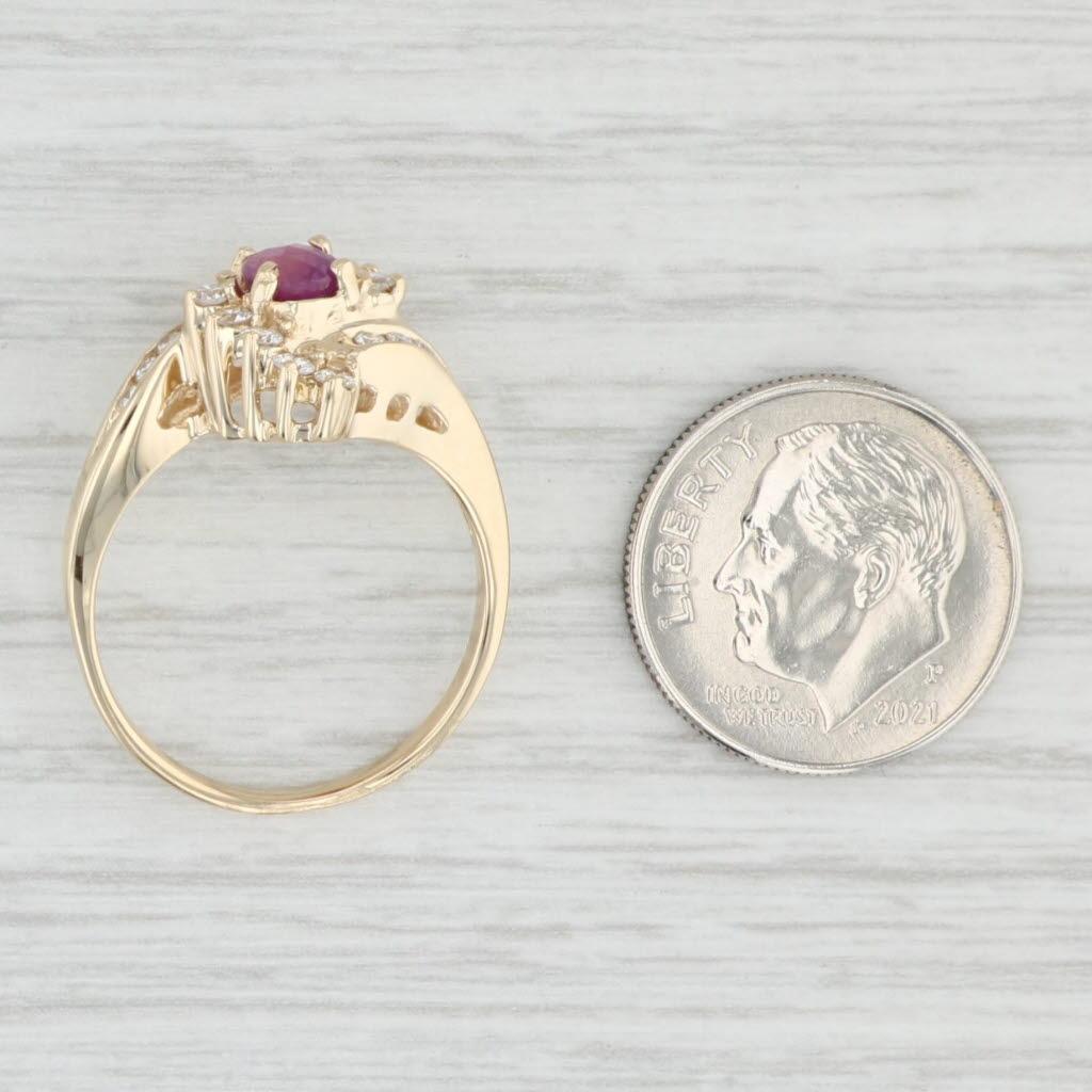 0.86ctw Oval Ruby Diamond Bypass Ring 14k Yellow Gold Size 7 en vente 2