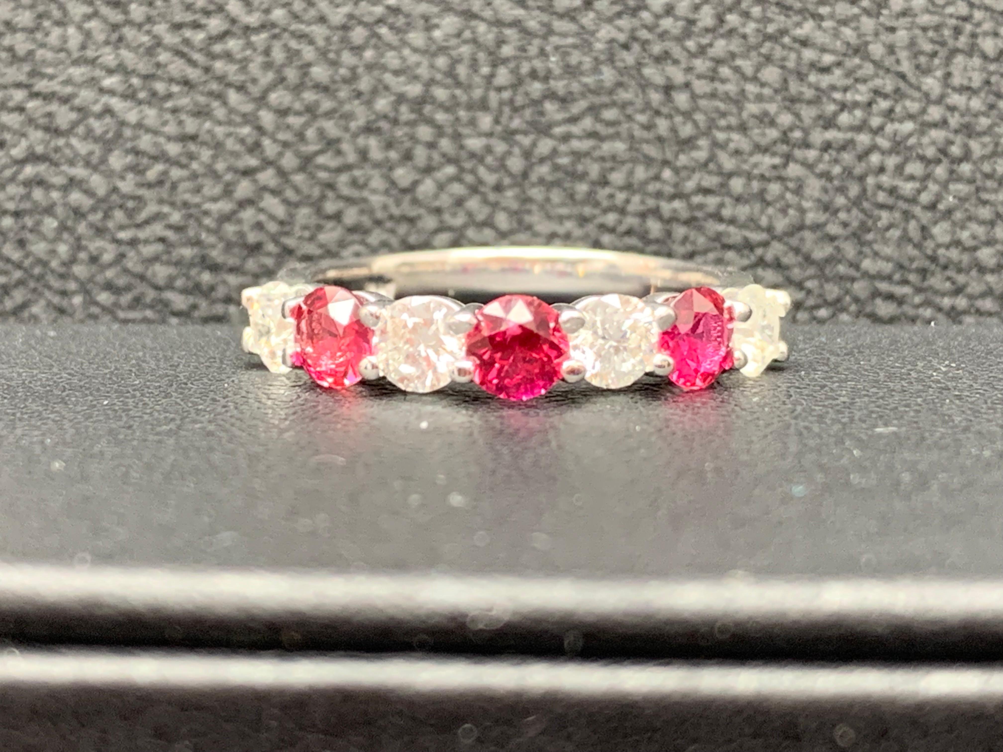 A fashionable and classic wedding band showcasing 3 color-rich red rubies weighing 0.87 carats total that alternate with 4 brilliant round diamonds weighing 0.75 carats total. Stones are secured with a shared prong setting made with 14 karats white