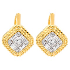 Orecchini a perno con diamante baguette da 0,87 carati Tiny Huggie in oro giallo 14 carati