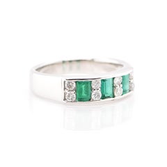 0.87 Carat Emerald and Diamond Band Ring Set in Platinum