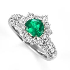 0.87 Carat Natural Colombian Vivid-Green Emerald & Diamond Ring Set in Platinum