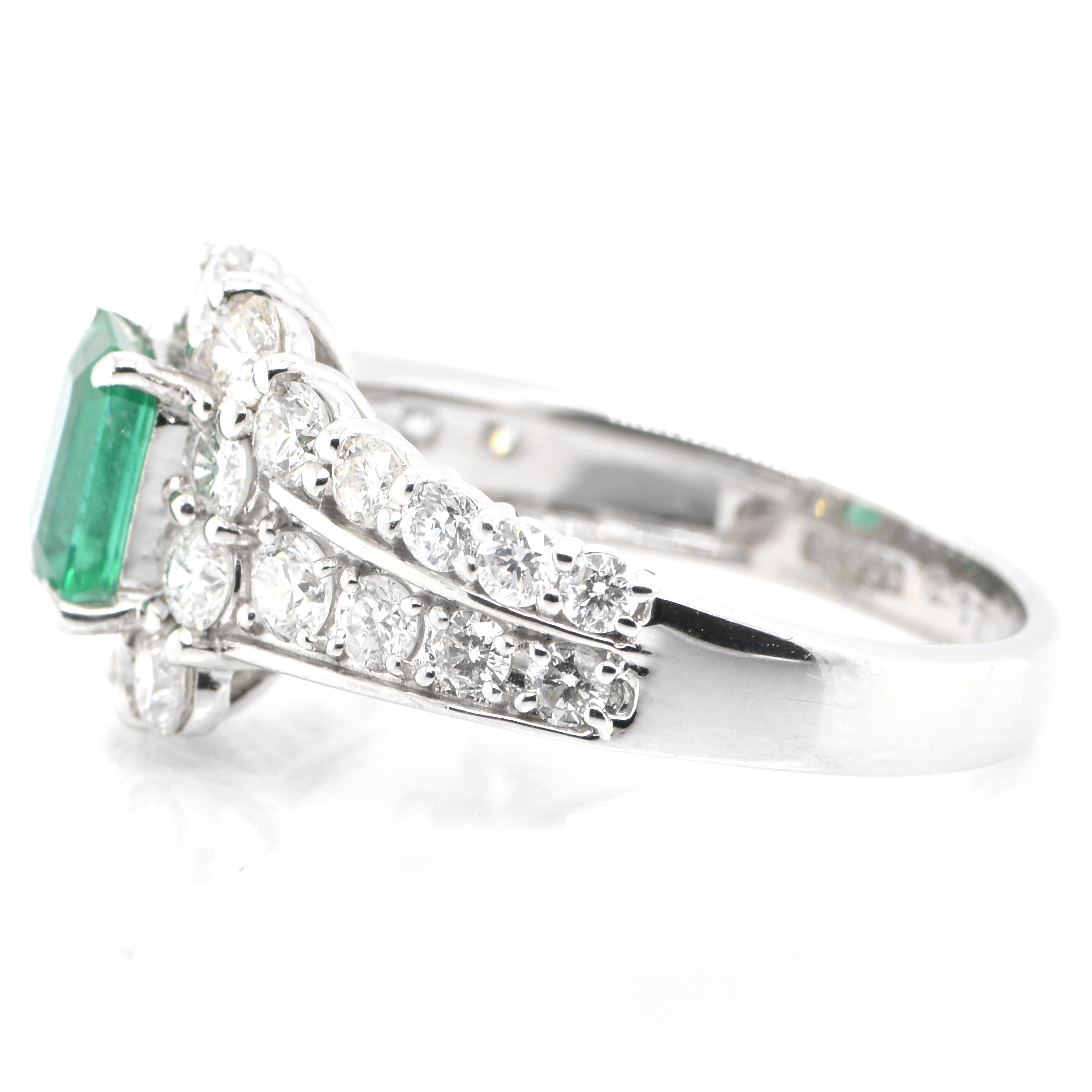 Modern 0.87 Carat Natural Emerald and Diamond Ring Set in Platinum For Sale