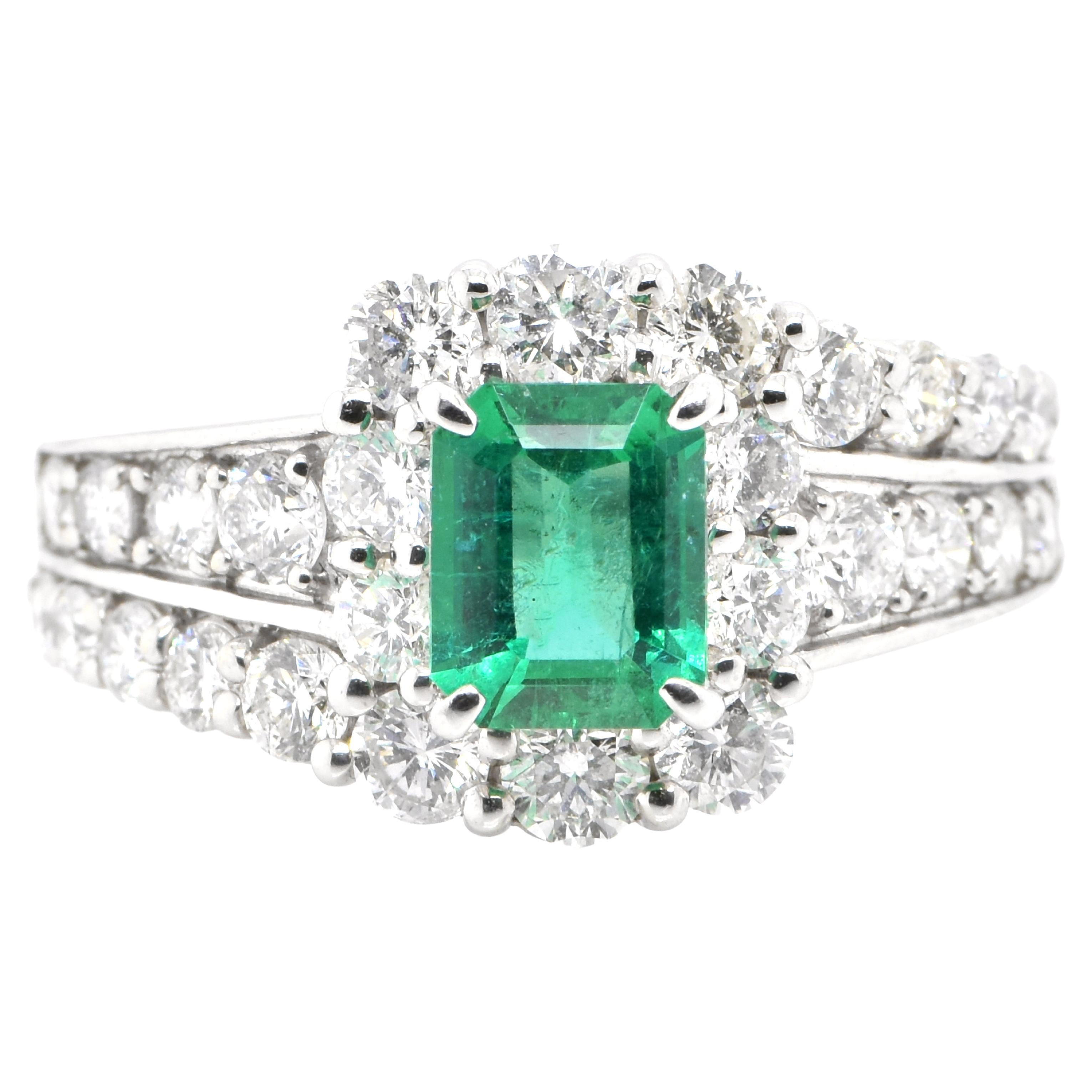 0.87 Carat Natural Emerald and Diamond Ring Set in Platinum For Sale