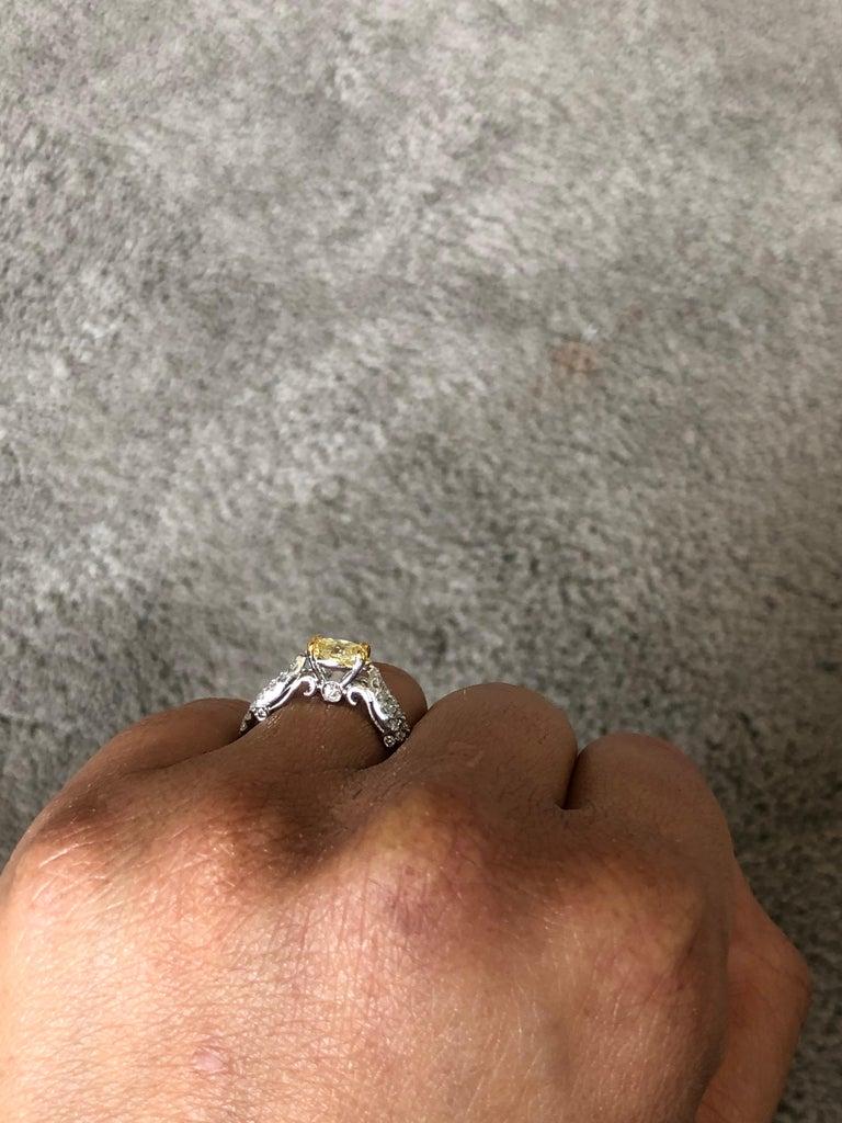 Women's 0.87 Carat Natural Fancy Yellow Diamond Engagement Ring 14 Karat White Gold For Sale