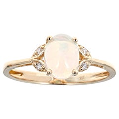 0.87 Carat Oval-Cab Ethiopian Opal Diamond Accents 10K Yellow Gold Ring