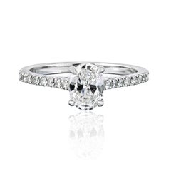 0.87 carat Oval Diamond E/SI1 GIA Soliatire With Pave Setting Engagement Ring