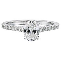 0.87 carat Oval Diamond E/SI1 GIA Soliatire With Pave Setting Engagement Ring