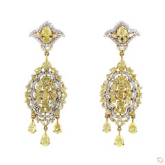 0.87 Carat Round Brilliant Cut White Diamond Yellow Diamond Gold Earrings