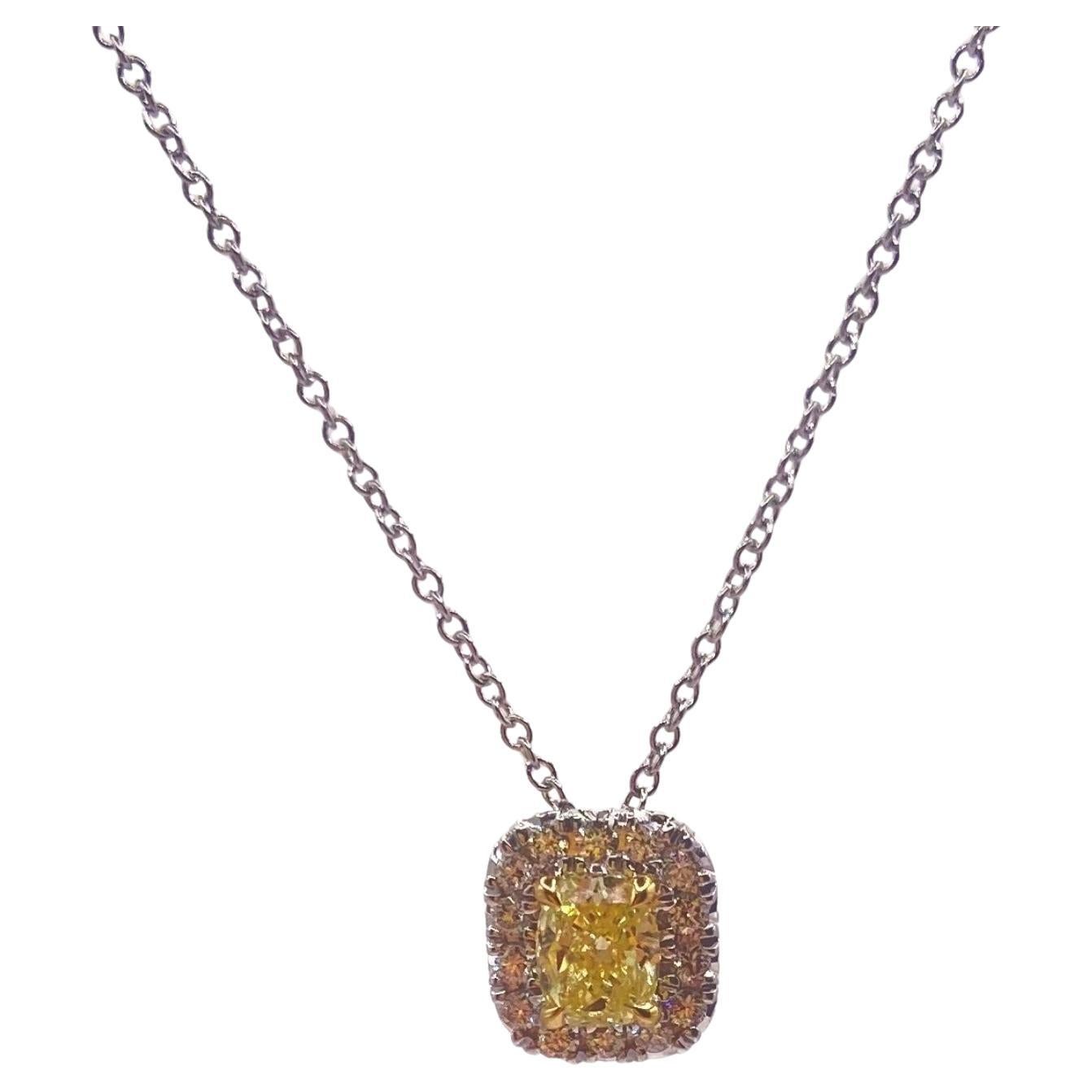 0.87ct Fancy Yellow Oval Diamond Halo Pendant in 18KT Gold For Sale