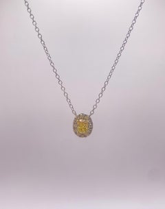 0.87ct Yellow Oval Diamond Halo Pendant in 18KT Gold