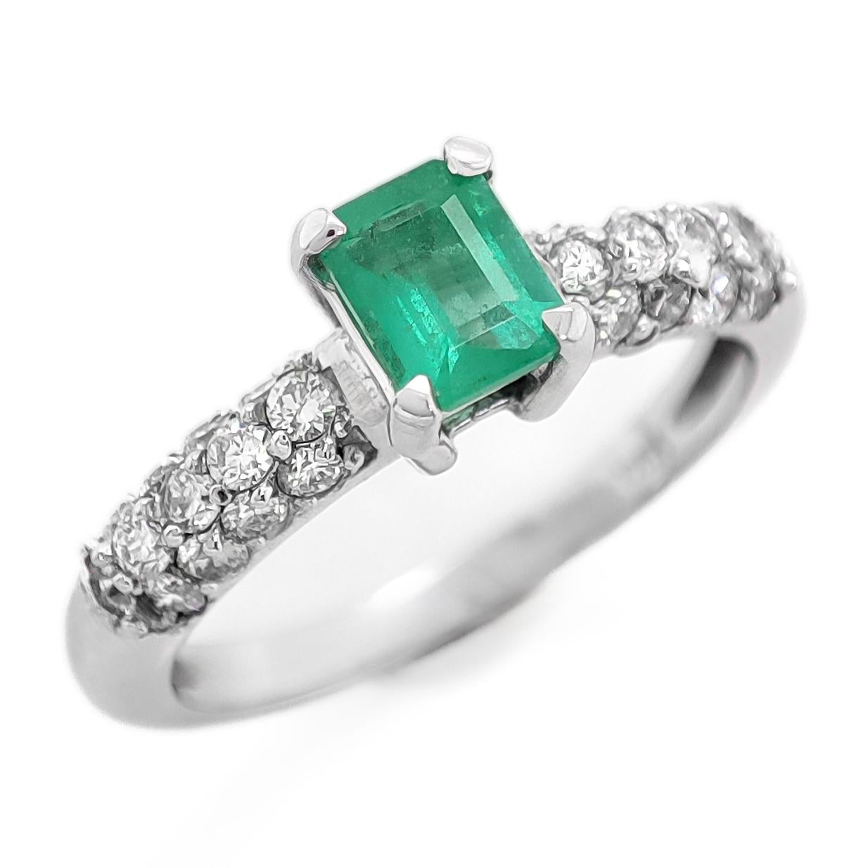 FOR US BUYER NO VAT

This enchanting ring features a 0.47 carat green emerald as its centerpiece, showcasing the lush and vibrant green hue that emeralds are prized for.

The emerald is elegantly complemented by 26 diamonds, totaling 0.40 carats.