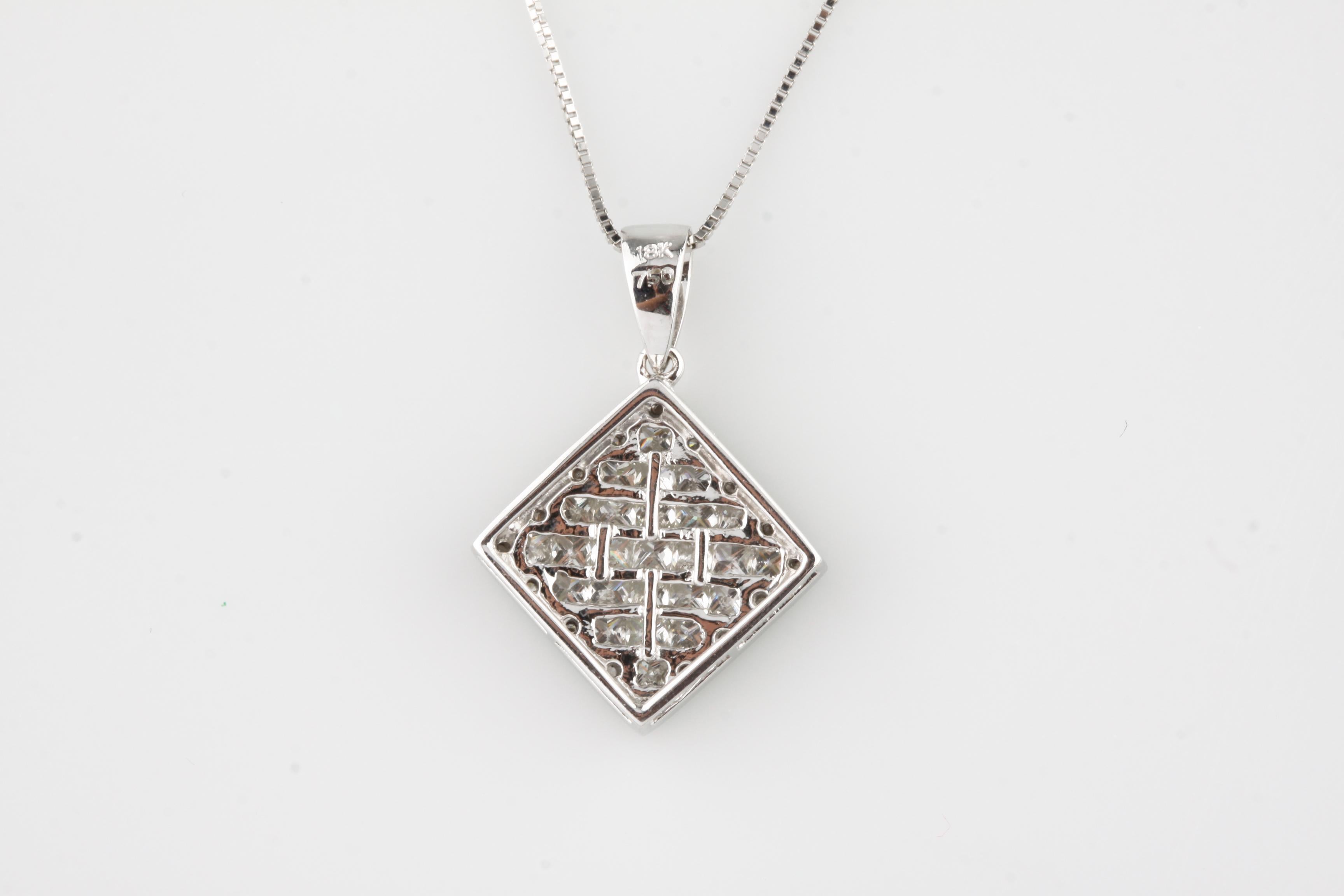 Gorgeous, Unique 14k White Gold Pendant Necklace
Features Invisible-Set Princess Cut Diamonds in Zig-Zag Bezel
Total Diamond Weight of Princess Diamonds = Approximately .80 ct
Around Zig-Zag Bezel are Pavé-Set Round Cut Diamonds
Total Diamond Weight