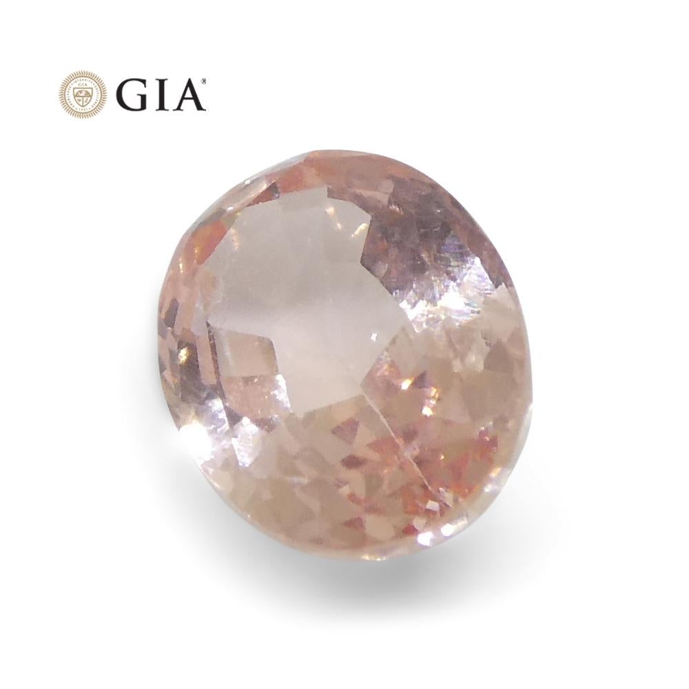0.88 Carat Oval Orangy Pink Padparadscha Sapphire GIA Certified Sri Lanka For Sale 7