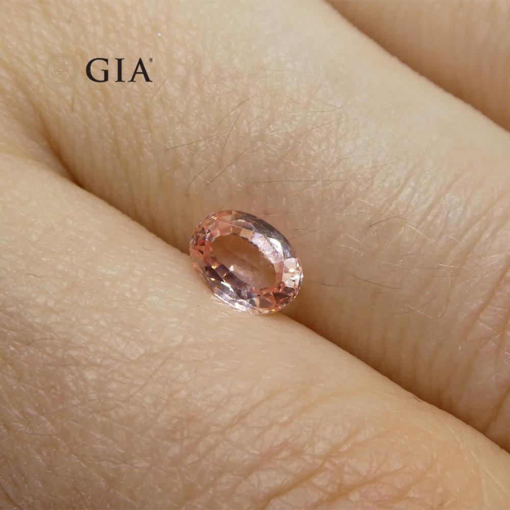 0.88 Carat Oval Orangy Pink Padparadscha Sapphire GIA Certified Sri Lanka For Sale 2
