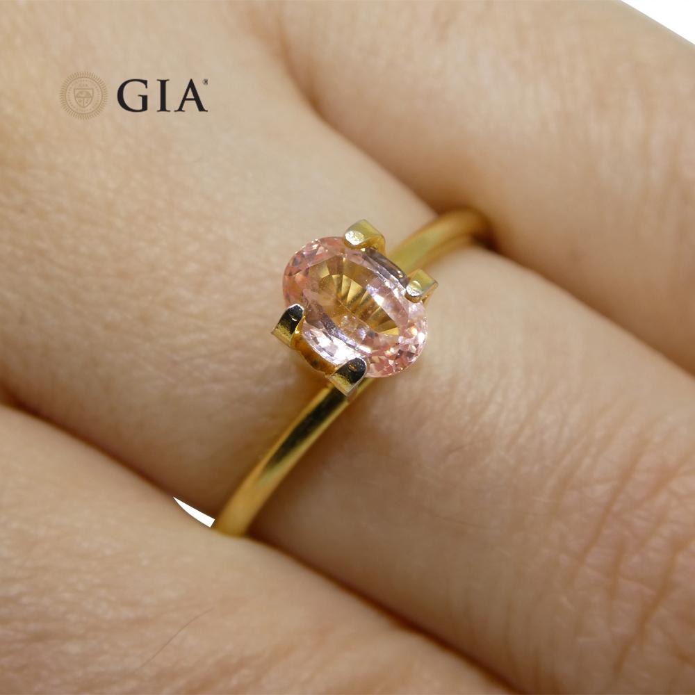 0.88 Carat Oval Orangy Pink Padparadscha Sapphire GIA Certified Sri Lanka For Sale 3