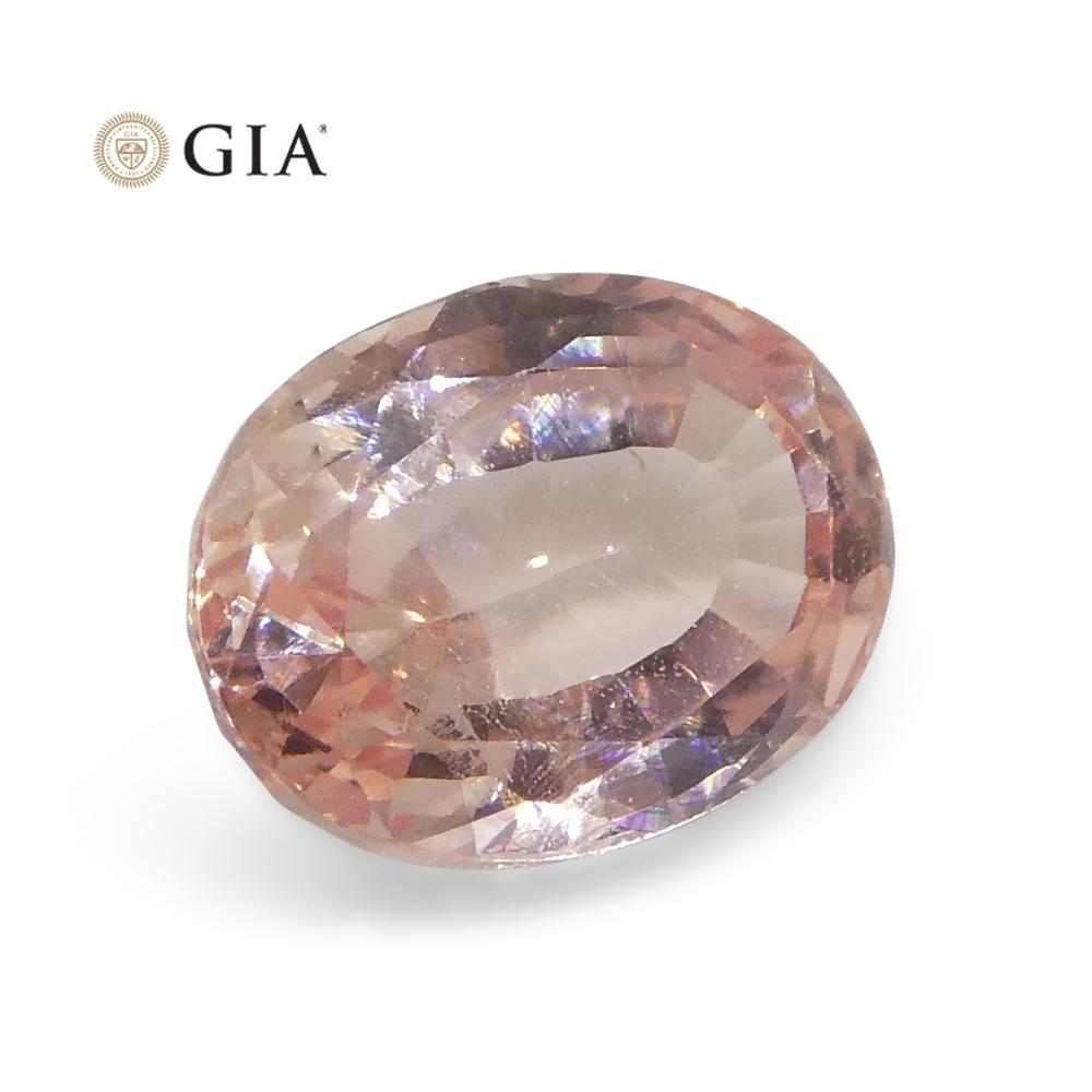 0.88 Carat Oval Orangy Pink Padparadscha Sapphire GIA Certified Sri Lanka For Sale 4