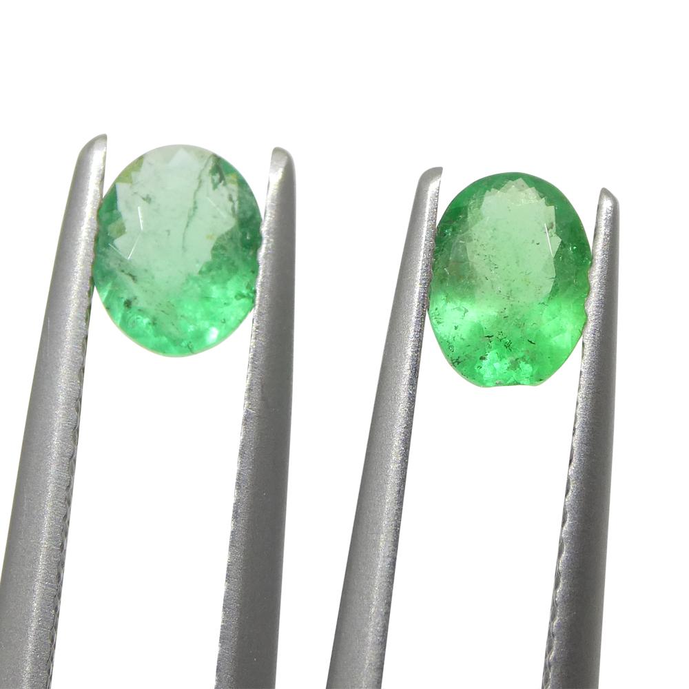 Brilliant Cut 0.88ct Pair Oval Green Emerald from Colombia For Sale