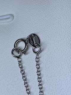 0.88ct Yellow sapphire pear shaped pendant in 18ct white gold.