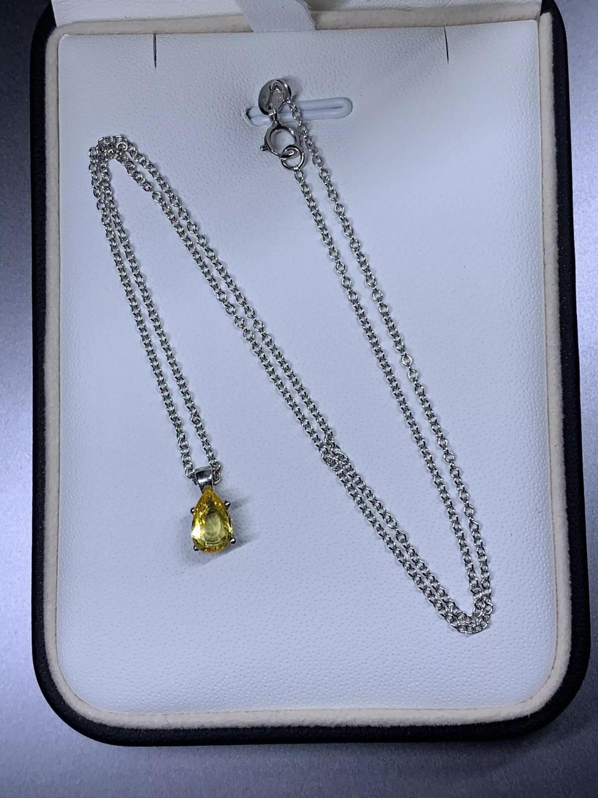 Pear Cut 0.88ct Yellow sapphire pear shaped pendant in 18ct white gold. For Sale