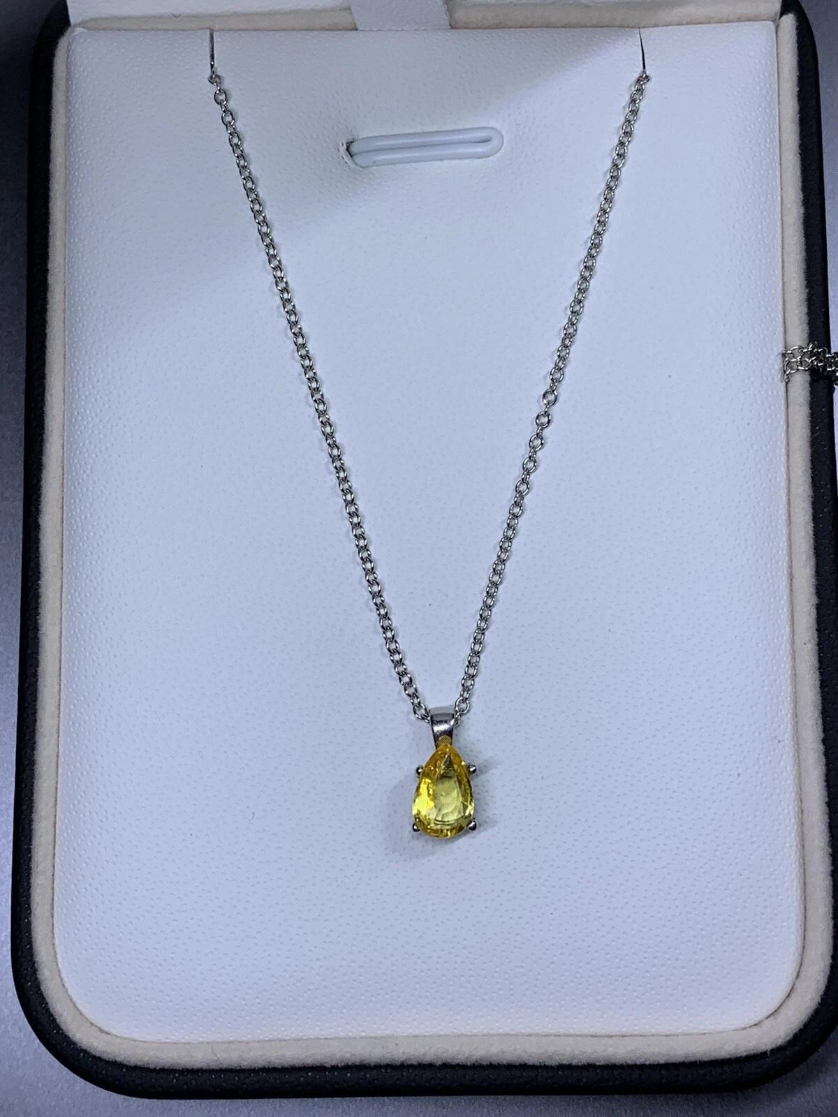 0.88ct Yellow sapphire pear shaped pendant in 18ct white gold. In New Condition For Sale In London, GB