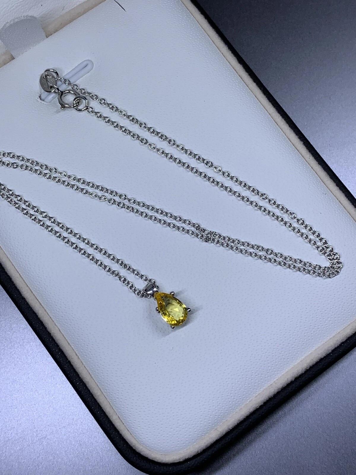 Women's or Men's 0.88ct Yellow sapphire pear shaped pendant in 18ct white gold. For Sale