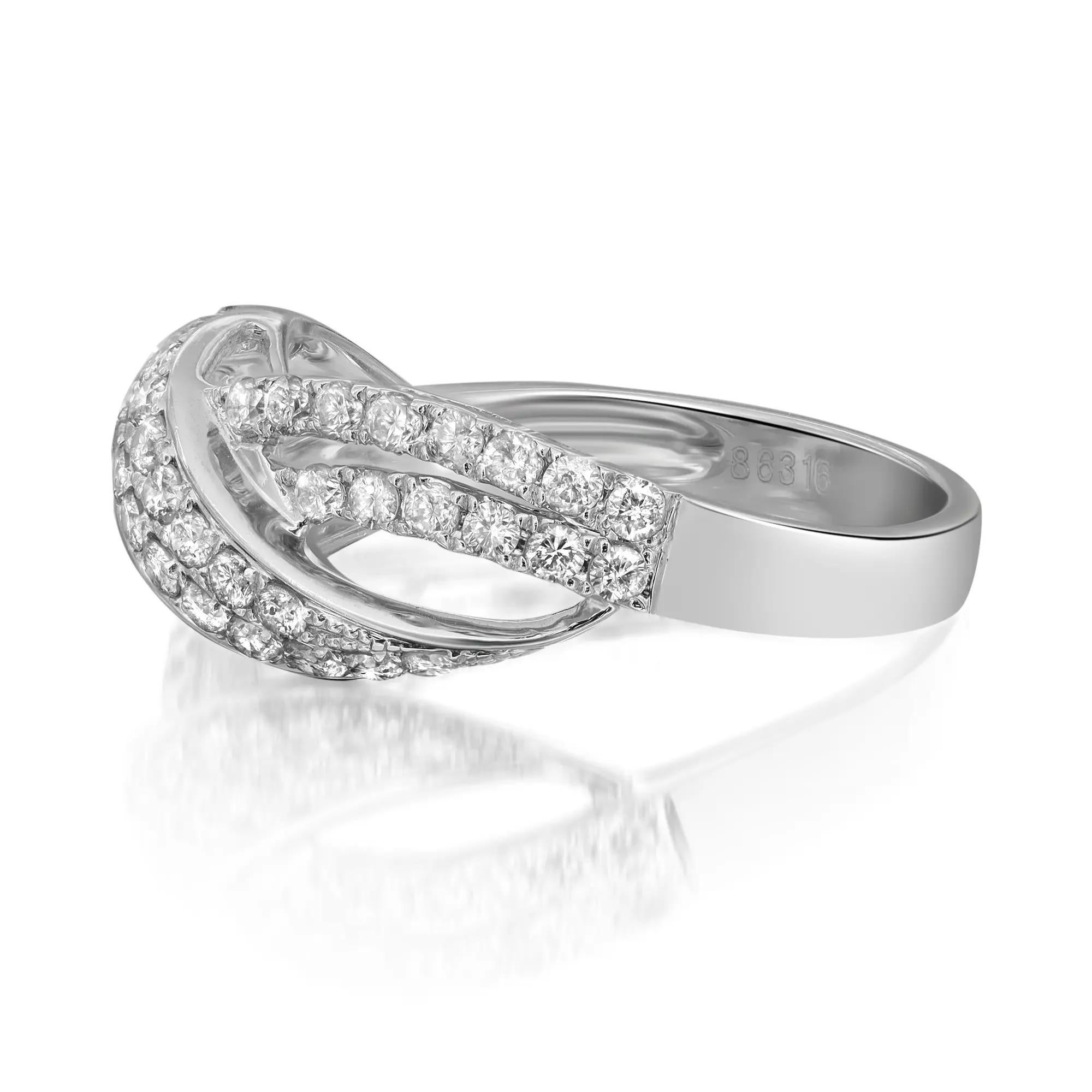 Classic and elegant diamond band ring rendered in highly polished 14K white gold. This ring features sparkling round brilliant cut diamonds in prong settings totaling 0.88 carat. Diamond quality: I color and SI1 clarity. Ring size: 7.75. Ring width: