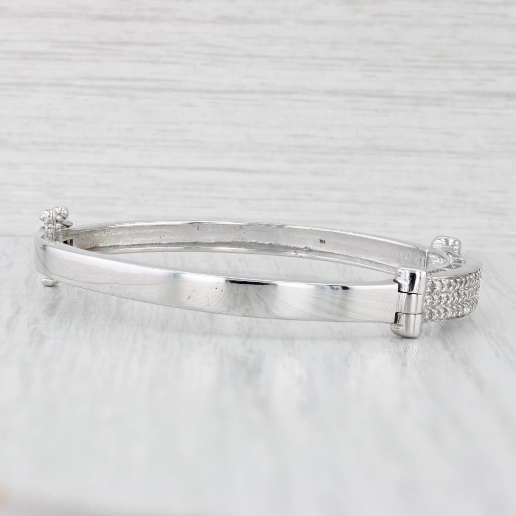 Gemstone Information:
- Natural Diamonds -
Total Carats - 0.88ctw
Cut - Round Brilliant
Color - I - J
Clarity - VS2 - SI1

Metal: 14k White Gold
Weight: 16.4 Grams 
Stamps: 14k
Chain Style: Bangle
Closure: Hinged snap clasp with latch
Inner