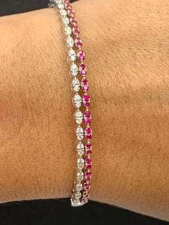 Brazalete de diamantes y rubí talla brillante de 0,89 quilates en oro mixto de 14 quilates